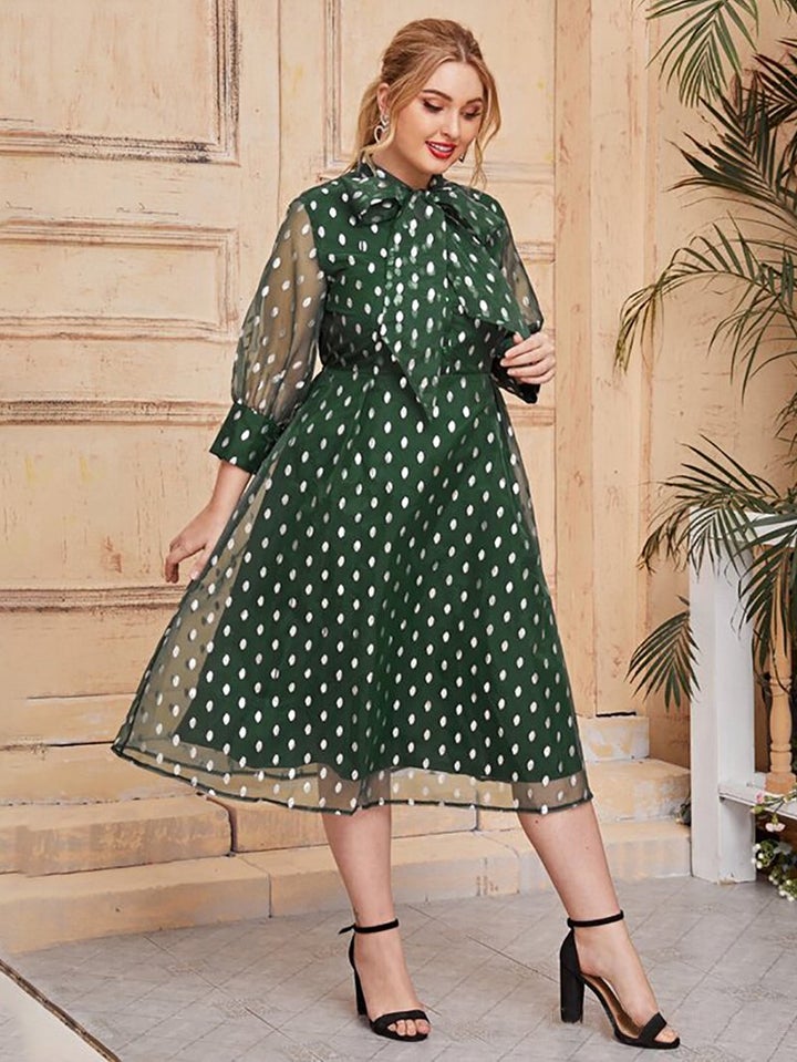 Green oversized dress with transparent sleeves